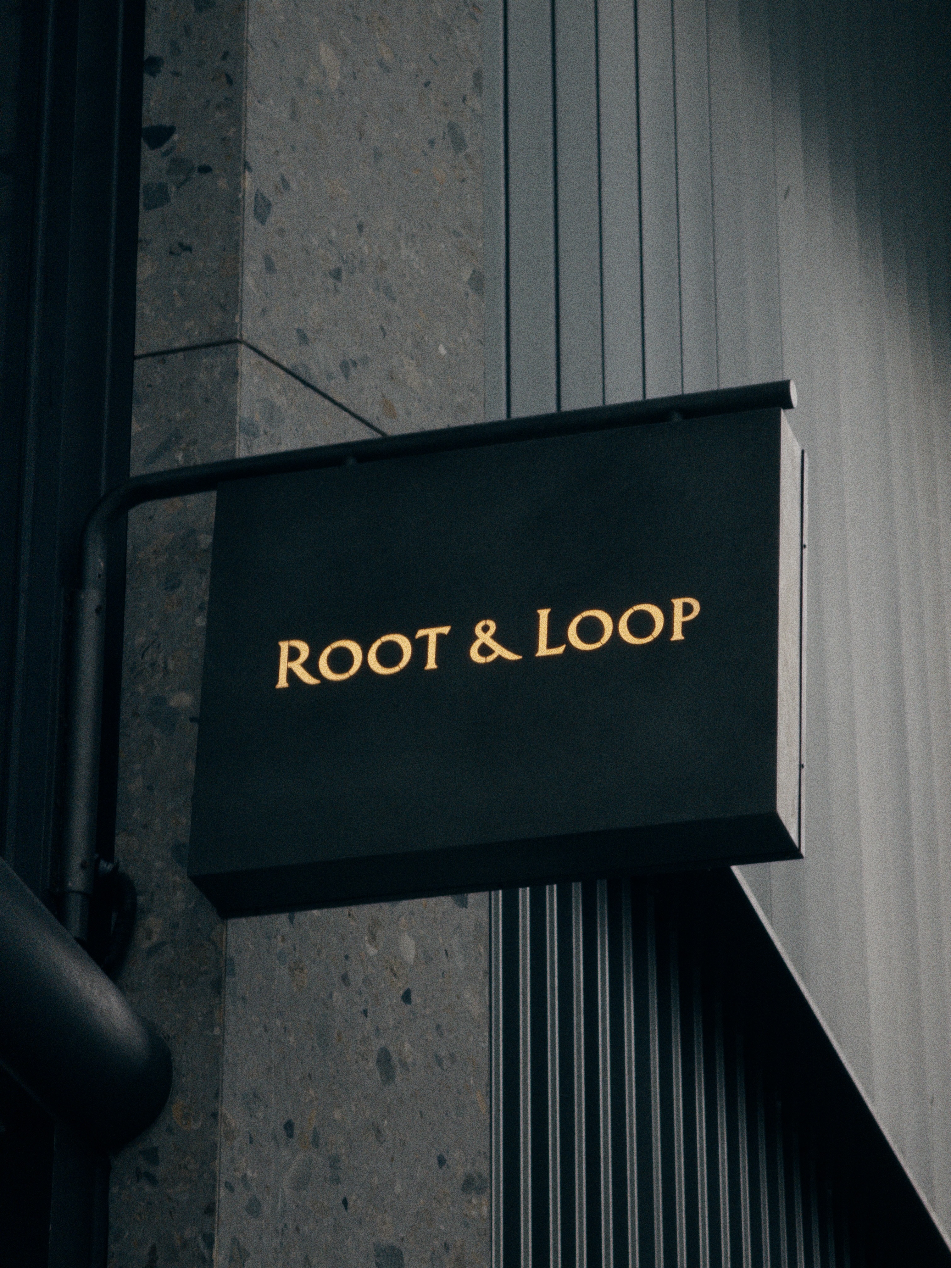 Sign of Root & Loop Coffee